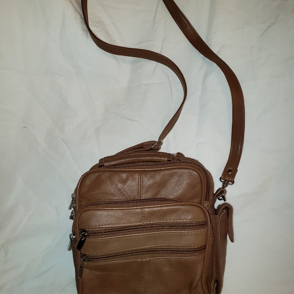 Tan multi pocketed cross body bag
